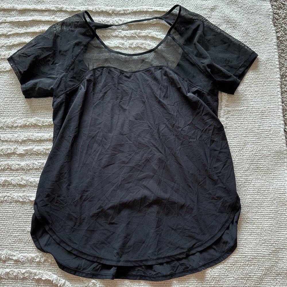 Black Lululemon Short Sleeve Workout Top with Mesh Detail (size 4)